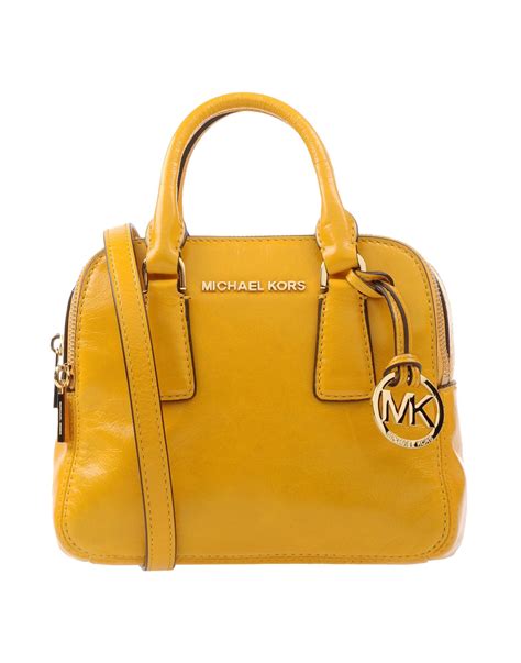 michael kors yellow purses.